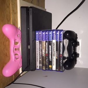 A PS4, 2 Controllers, a headset, 10 video games.